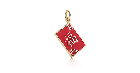 Chinese "Wealth" charm in 18k gold with red enamel finish. | Tiffany & Co.