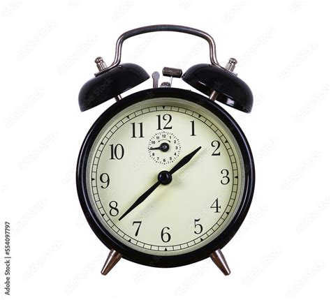 old fashioned black and white traditional alarm clock on transparent ...