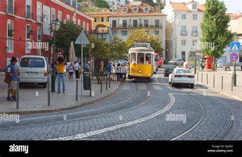 Old Lisbon tram in Alfama Stock Photo - Alamy