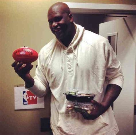 Shaq holding an AFL football and I’m pretty sure sure sushi : r ...