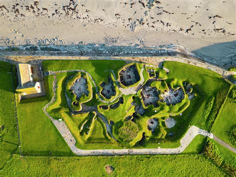 Aerial view of Skara Brae stone-built Neolithic settlement, Orkney ...