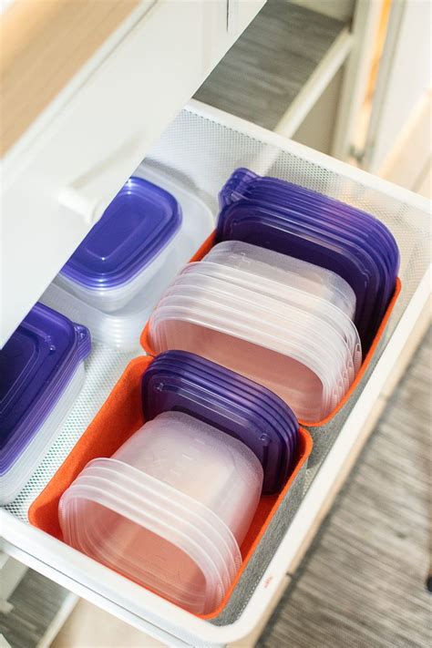 book bins for the win | Food storage containers organization, Tupperware organizing, Tupperware ...