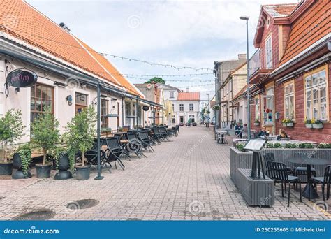 Parnu Old Town Street with Traditional Houses and People Sitting at the Tables Editorial Image ...