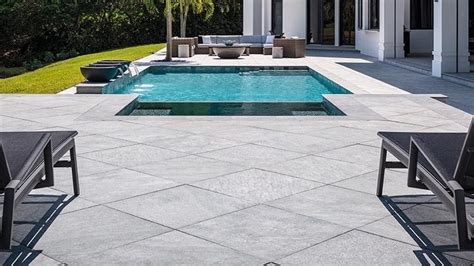 Belgard launches porcelain paver line | Pool pavers, Pool patio, Concrete pool