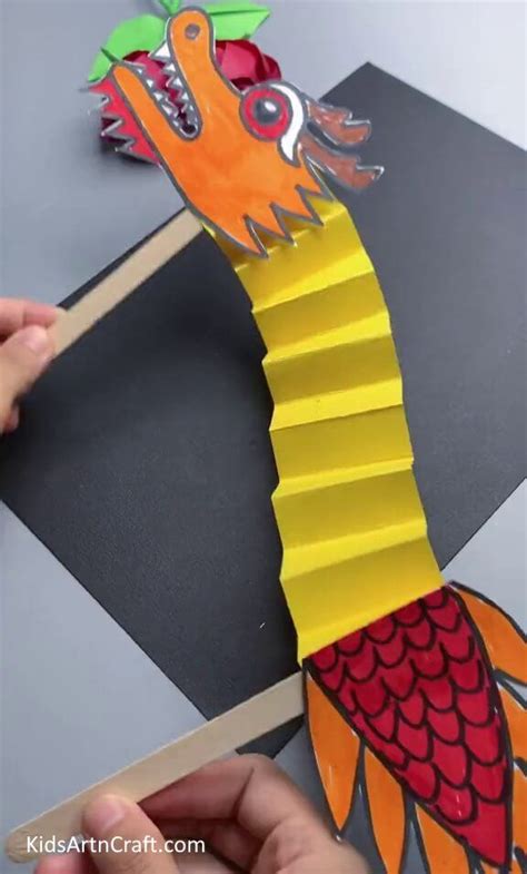 Easy Chinese Paper Dragon Craft Tutorial | Dragon crafts, Paper dragon ...