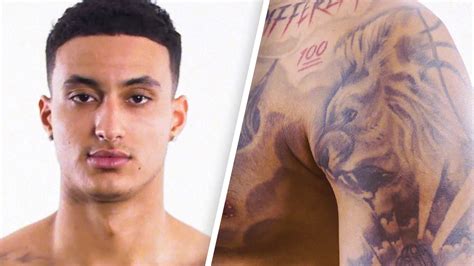 Watch Kyle Kuzma Breaks Down His Tattoos | Tattoo Tour | GQ