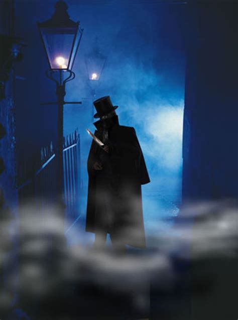 a man in a top hat and coat holding a knife