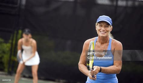 Womens Tennis Doubles Team High-Res Stock Photo - Getty Images