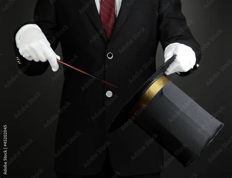 magician performance on dark background Stock Photo | Adobe Stock