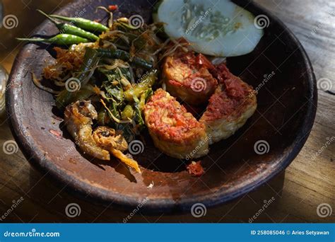 Tempe Penyet in a Traditional Stone Mortar Stock Photo - Image of bean, curry: 258085046