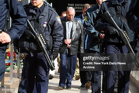 Domenico Cefalu is walked from the FBI's New York Field Office at 26 ...