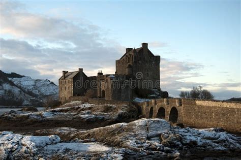 Winter at Eilean Donan Castle Stock Photo - Image of covered, shoreline ...