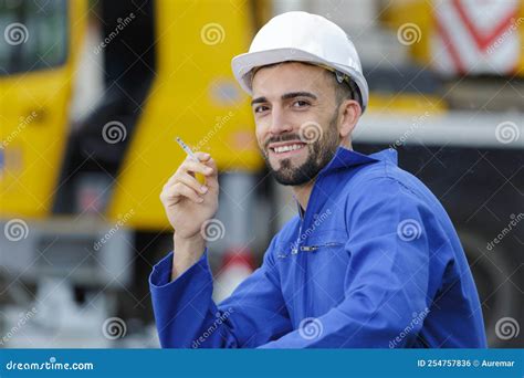 Builder Smoking Cigarette on Construction Site Stock Photo - Image of roadwork, smoke: 254757836