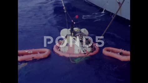 Apollo 8 capsule after splashdown in Pacific Ocean - 1968 Stock Footage ...