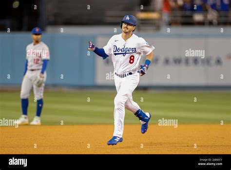 Los Angeles Dodgers designated hitter Zach McKinstry (8) hits a home ...