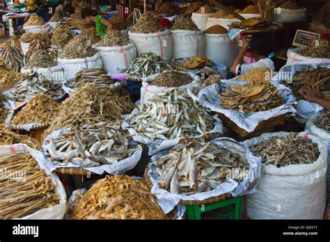 Selling dried fish at the market, Mandalay, Myanmar Stock Photo - Alamy