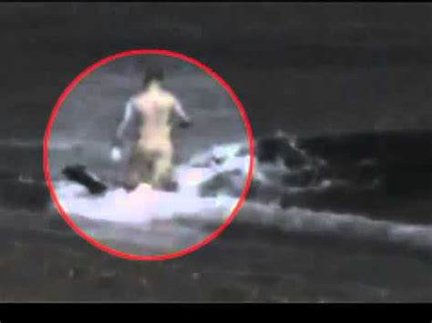 Killer Whale Attacks Man On Beach - WARNING: Graphic