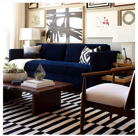 Navy couch and striped rug | Eclectic living room, House interior, Living room decor