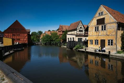 Scene of the Buildings of the Den Gamle by Museum by the Lake Surrounded by Trees in Aarhus ...