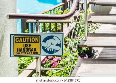 Warning Use Handrail Sign On Stairs Stock Photo 642384391 | Shutterstock