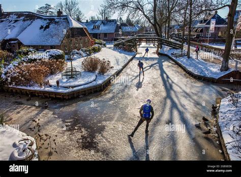 The Netherlands, Giethoorn, Village with almost only waterways. Winter, frost, ice skating Stock ...