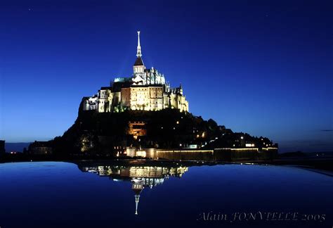 Mont Saint Michel at night Photograph by QUERIDO Al - Fine Art America