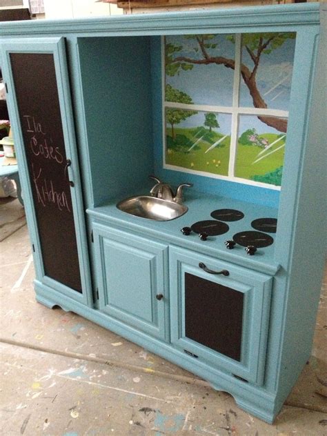 Transformed old entertainment center into Kids Kitchen Set! We love ...