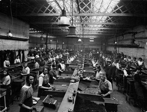 Derby, 1928: Workers cast mouldings in the core shop at Leys Malleable Castings Company. This ...