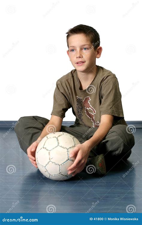 Boy With Soccer Ball 2 stock photo. Image of young, knee - 41800