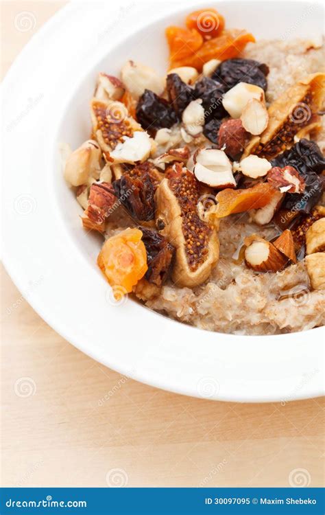 Oatmeal with raisins stock image. Image of brown, breakfast - 30097095