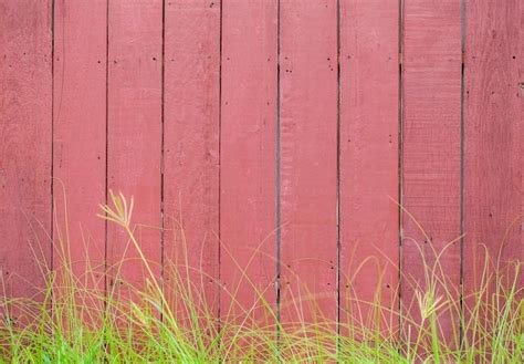 Premium Photo | Wood fence texture pattern background with green grass