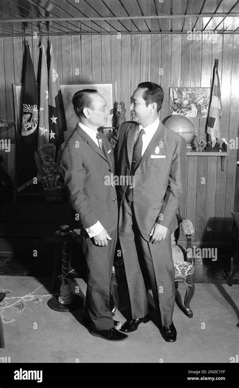 Cambodian President Lon Nol, right, embraces former Prime Minister Sirik Matak in Phnom Penh ...