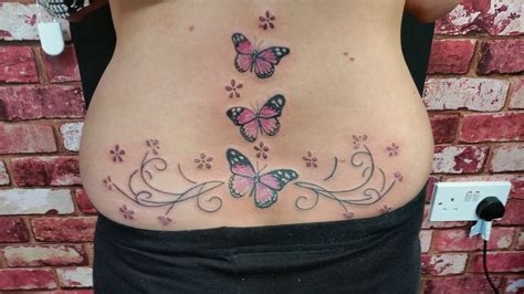 butterfly lower back custom design | Paw print tattoo, Infinity tattoo ...