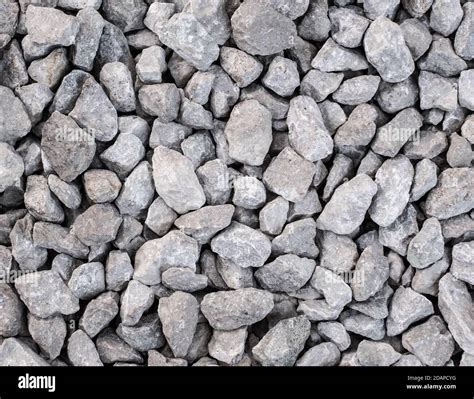 Gray broken rocks, loose gravel, construction and mining business Stock ...