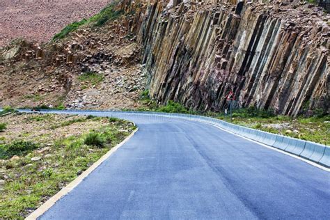 Winding road in mountains stock image. Image of paved - 15549021