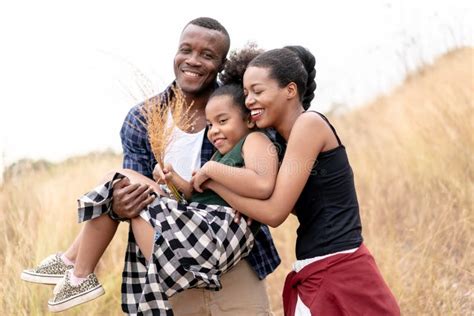 African American Family Looking Very Happy Outdoors Stock Photo - Image ...