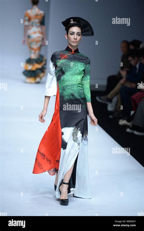 A model displays a new creation by designer Gong Hangyu at the fashion ...