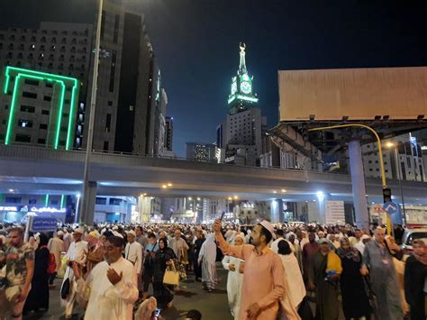 Mecca, Saudi Arabia, April 2023 - Pilgrims from different countries of the world are outside ...