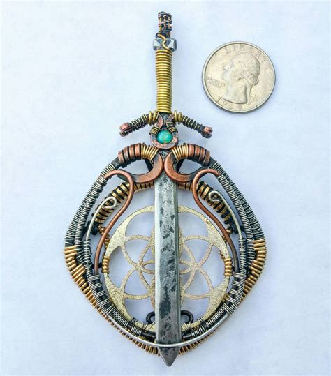 Sword and Shield Amulet Combo [wire wrap] by herolink86 on DeviantArt