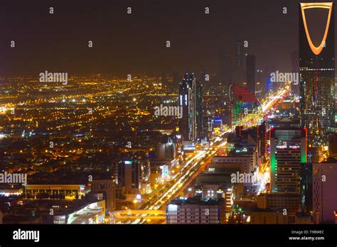 Panorama view to the skyline of Riyadh by night, with the Kingdom ...