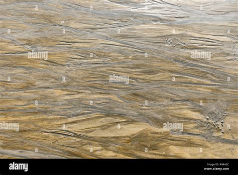 ripple marks on a sand beach Stock Photo - Alamy