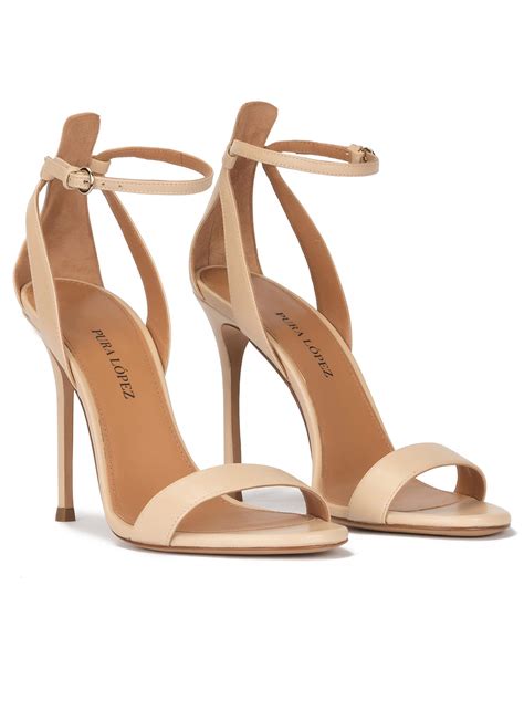 Ankle strap high heel sandals in beige leather . PURA LOPEZ