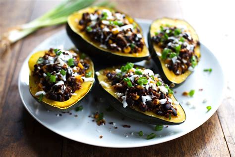 Mexican Roasted Corn and Quinoa Stuffed Squash: loaded with red quinoa, black beans, roasted ...