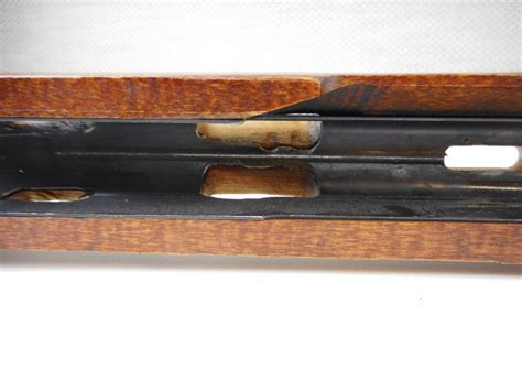 RUGER MINI 14 WOOD STOCK - Switzer's Auction & Appraisal Service