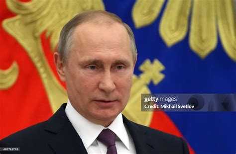 Russian President Vladimir Putin speaks during an awards ceremony at ...