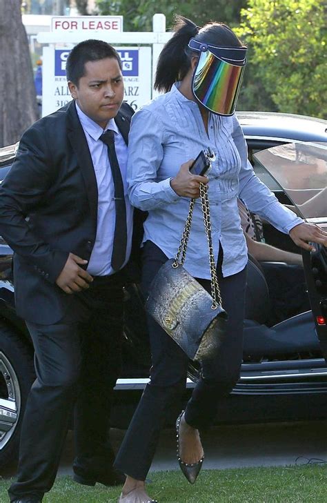 Donald Sterling’s mistress V. Stiviano is hiding her face with a visor ...