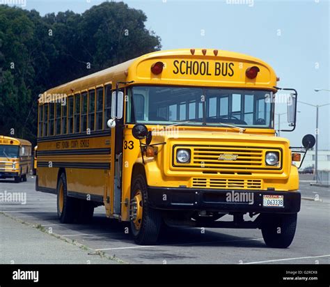 A bright yellow American school bus Stock Photo - Alamy