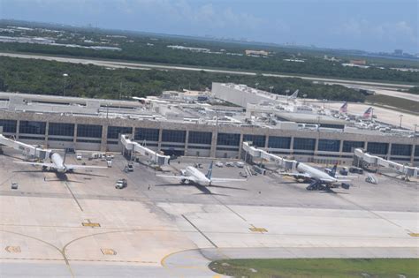 several airplanes are parked at an airport terminal