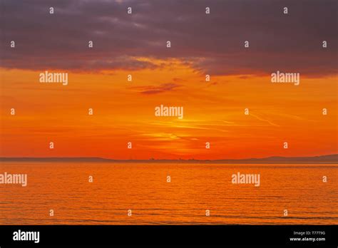 Sunset over the Bristol channel Stock Photo - Alamy