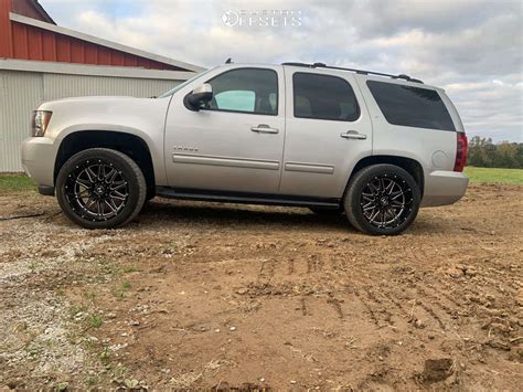 2010 Chevrolet Tahoe with 22x10 -24 Hostile Blaze and 285/50R22 Delinte Dx-10 Bandit At and ...